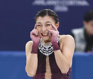 団体女子フリーの演技を終え笑顔を見せる坂本(撮影･前田充)