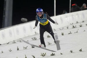 ジャンプ混合団体で競技に臨む高梨(撮影･パオロ　ヌッチ)