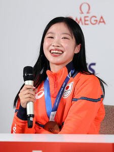 メダル獲得から一夜明け、笑顔で会見に臨む中井亜美(撮影･前田充)