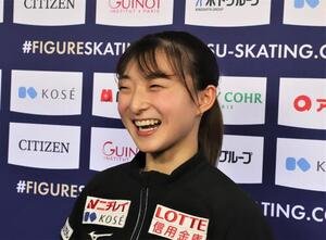 世界選手権公式練習後に笑顔を見せる坂本(撮影･藤塚大輔)