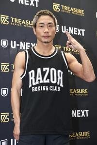 ポーズを決める谷口(撮影･宮地輝)