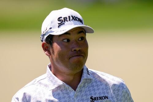 松山英樹は全米プロ選手権第3日、1番グリーン上でパット後に表情を崩した(AP)