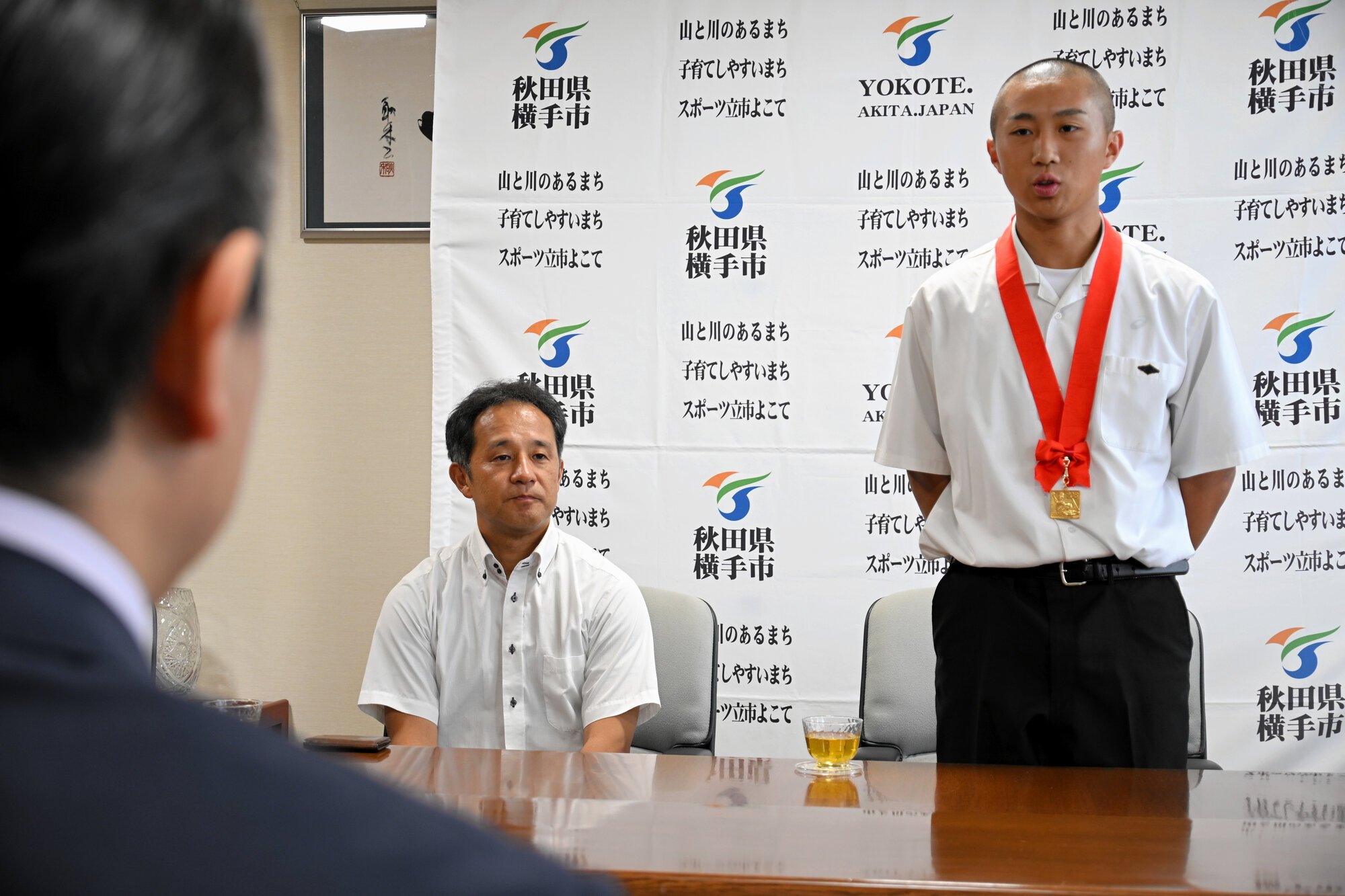 抱負を語る横手の熊谷昌太主将=2026年7月27日、横手市役所、横山翼撮影