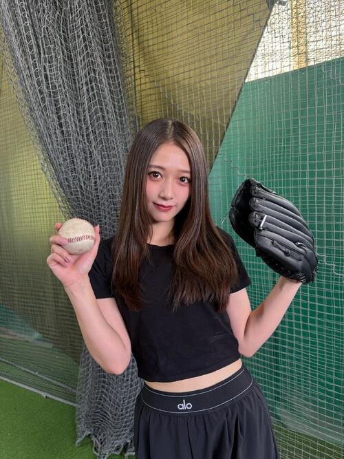 ファーストピッチに向けて練習する谷本安美